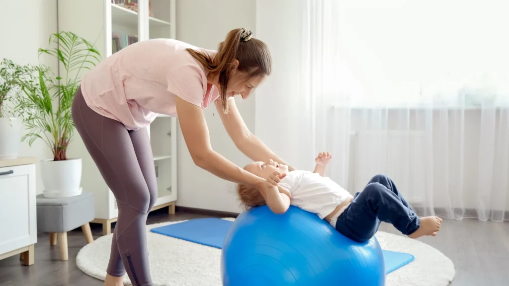 Behandeling van voorkeurshouding en schedelafplatting door de kinderfysiotherapeut in Echt.